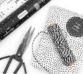 cadeaupapier wit met zwarte dots